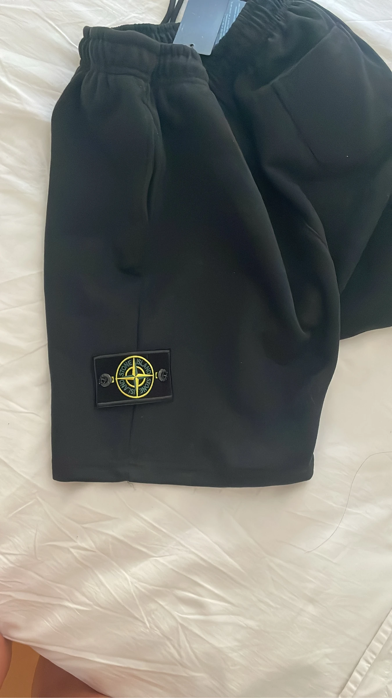 Calça com etiquetas – photo 2